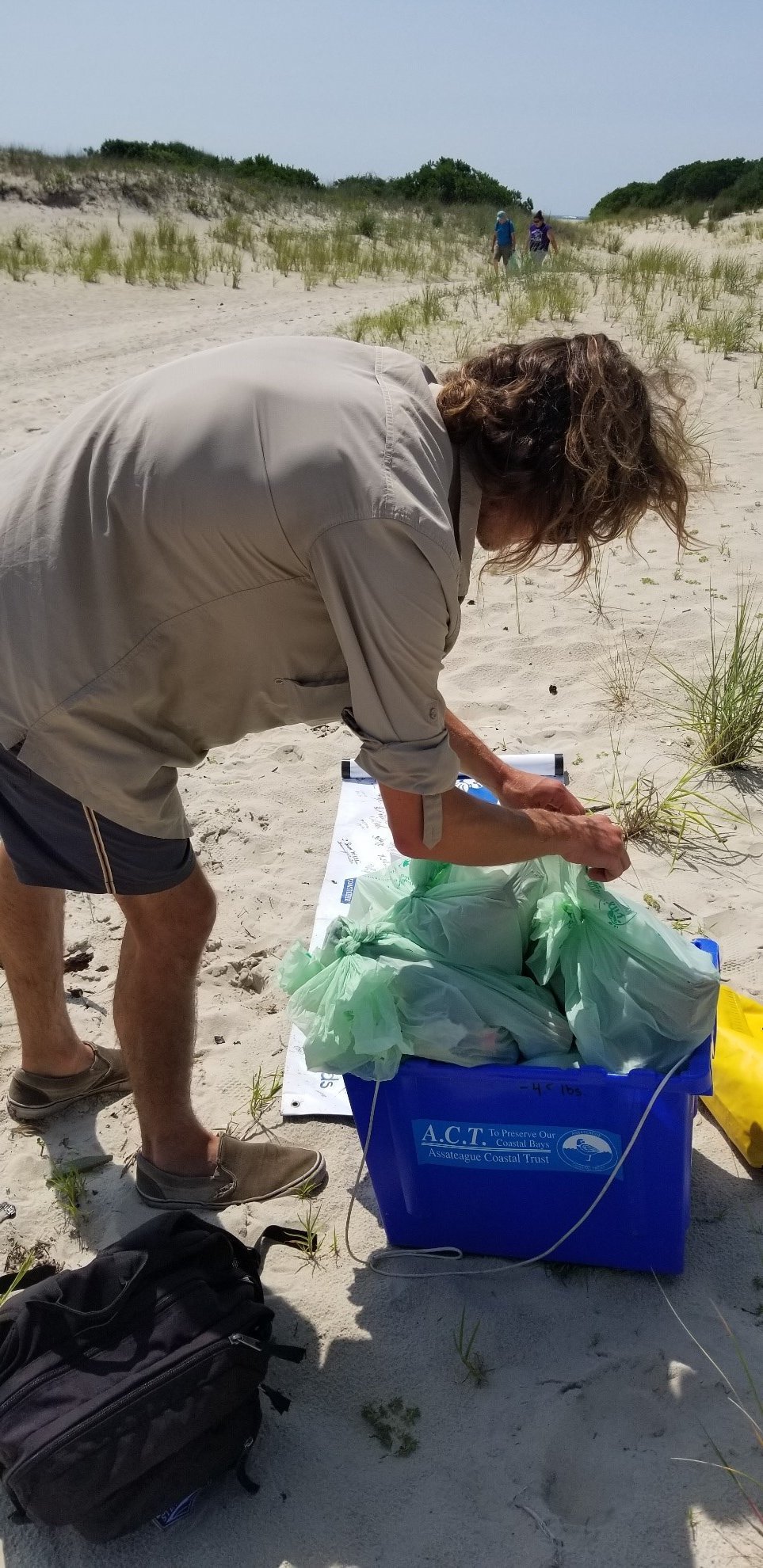Billy-Weiland-of-Assateague-Coastal-Trust-www.actforbays.org-weighing-trash-collected-during-one-of-their-cleanup-events.jpg#asset:988